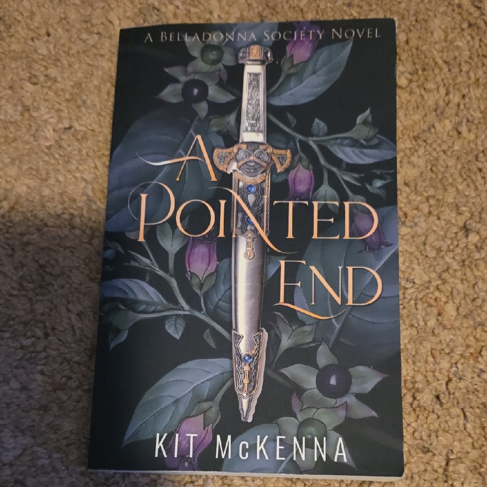 A Pointed End by - Black and Gray Coffee Table Book